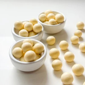 Drageados de Castanha do Pará trufado com chocolate Branco 100grs